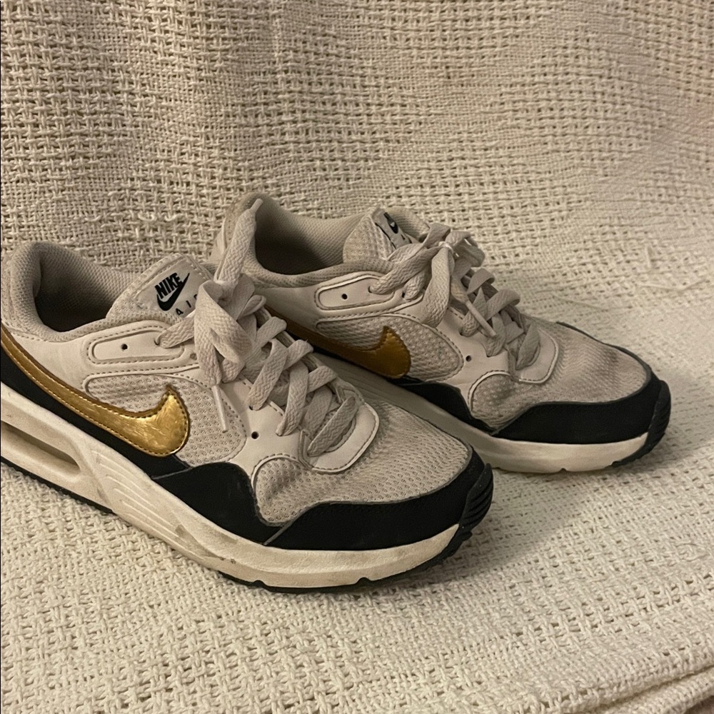 Nike Sneakers with Gold and Black Highlights